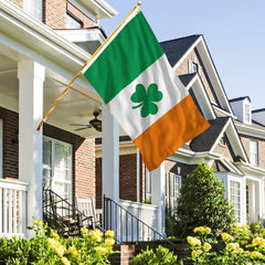 AhfuLife Shamrock Flag displayed in a garden setting
