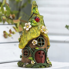 AIINY fairy statue side view with warm glow
