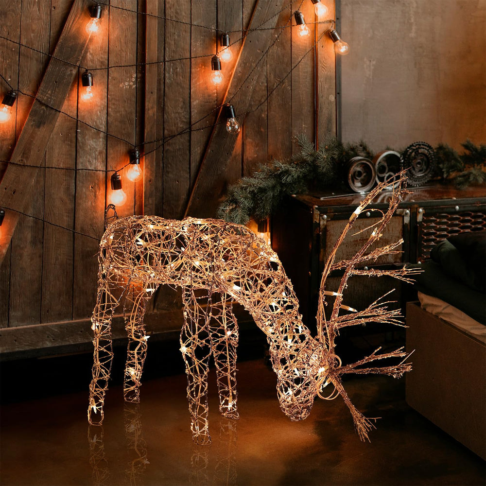 Alpine Corporation 24" Tall Rattan Grazing Reindeer with LED lights front view