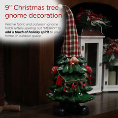 Alpine Gnome Statue illuminated with color-changing LED lights