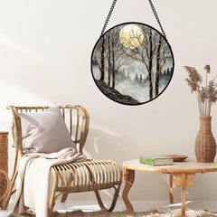 AMDERVEN stained glass suncatcher hanging in window with sunlight