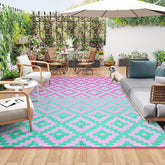 Anidaroel outdoor rug 6' x 9' in green and pink geometric design