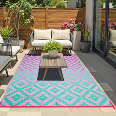 Anidaroel outdoor rug folded for portability in carrier bag