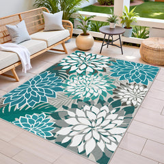Arenarug Outdoor Rug 5' x 8' teal rug in garden setting