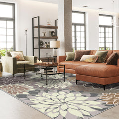 Arenarug Outdoor Rug 5x8 floral pattern on a patio