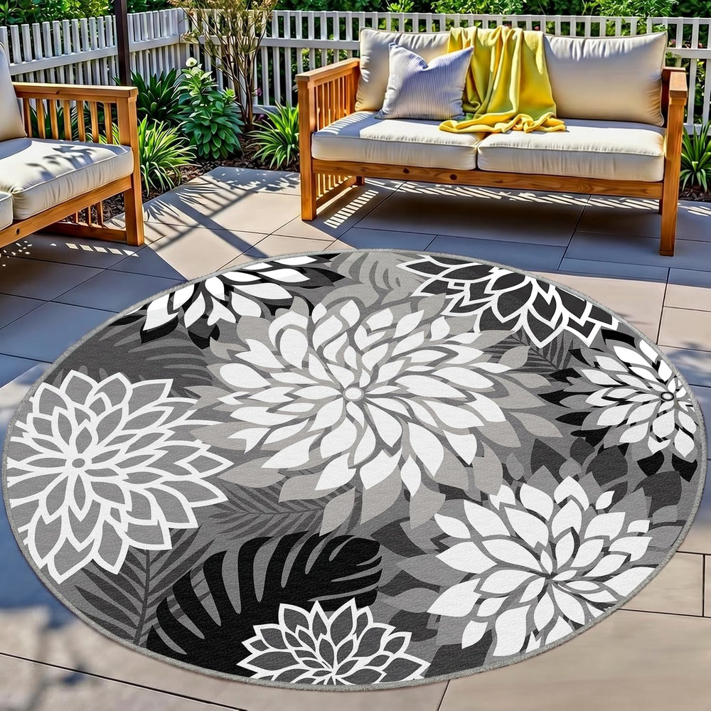 Arenarug Outdoor Rug 6' Round black floral pattern front view