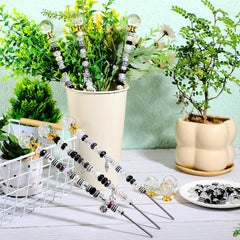 Assembly of Tigeen garden stakes with beads and pendants