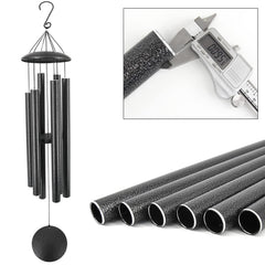ASTARIN wind chimes hanging in a garden