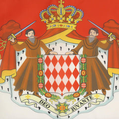 AZ FLAG Monaco Coat of Arms Flag displayed outdoors in a garden setting