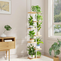 Bamworld plant stand displaying various plants and decor items