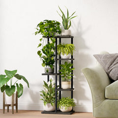 Bamworld Plant Stand showcasing plants and decor items