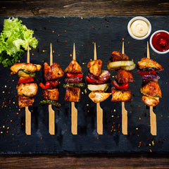 BBQStyle bamboo skewers used for grilling kebabs