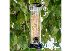 Bird feeder filled with Lyric Fine Tunes Wild Bird Seed