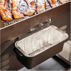 BLACKSTONE grease cup liner in a drip tray