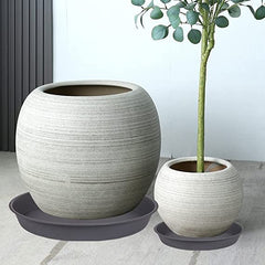 Bleuhome plant saucer with potted plant on a patio