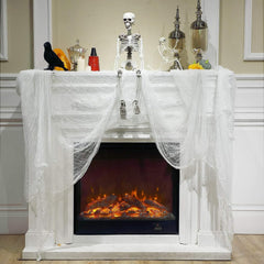 Boao cheesecloth draped across a mantel for Halloween decor