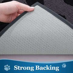 Buganda Dog Door Mat in use at an entryway with muddy paws