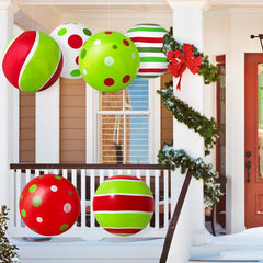 Bunny Chorus Christmas inflatables hanging from a porch