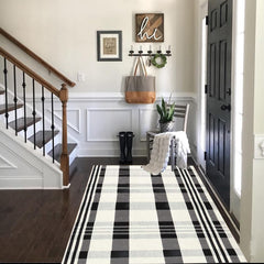 CAINANEL Buffalo Plaid Outdoor Rug on a porch