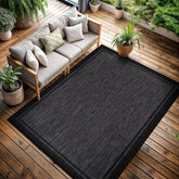 CAMILSON Indoor Outdoor Rug 6'7" x 9' bordered black front view