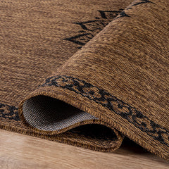 CAMILSON Outdoor Rug 6x9 Medallion Gold in garden setting