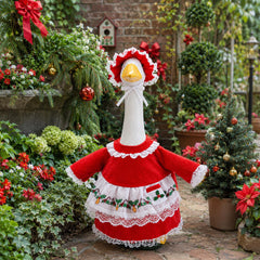 Christmas Goose Outfit displayed in a garden setting