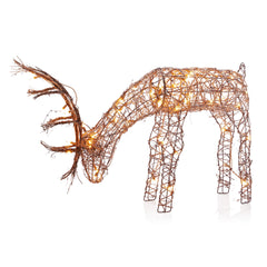 Close-up of Alpine Rattan Grazing Reindeer featuring warm white LED lights