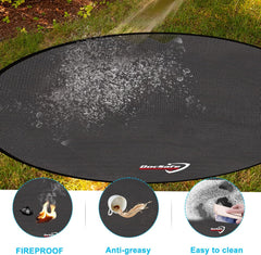 Close-up of DocSafe fire pit mat with grease stains being cleaned
