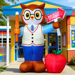 Close-up of DomKom Inflatable Professor Owl showing its book and apple