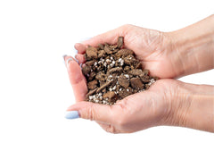 Close-up of Gardenera soil blend ingredients including pine bark and perlite