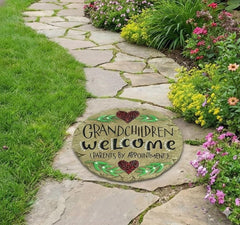 Close-up of intricate beadwork on Carson Grandchildren Welcome Garden Stone