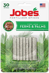 Close-up of Jobe's Fern & Palm Fertilizer Spikes packaging and contents