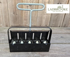 Close-up of Ladbrooke Mini 5 seed pins included