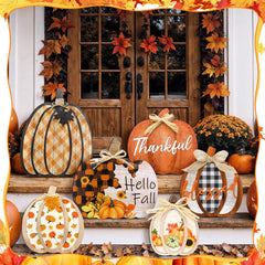 Close-up of Moucuny pumpkin porch sign with vibrant autumn colors