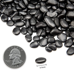 Close-up of OUPENG black decorative pebbles showing their smooth surface