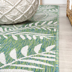 Close-up of palm frond pattern on JONATHAN Y Runner Rug
