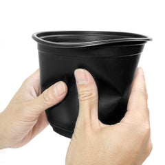 Close-up of RAOOKIF nursery pot drainage holes