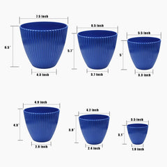 Close-up of RooTrimmer 7.5-inch plant pot with saucer