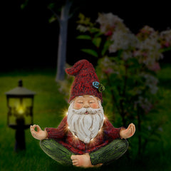Close-up of Smadeer Yoga Gnome's vibrant red hat and green trousers