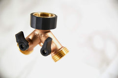 Close-up of the ball-valve levers on the Orbit Brass Dual-Outlet Faucet Adapter