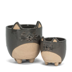Close-up of the ceramic texture of the Small Cat on Legs Planter