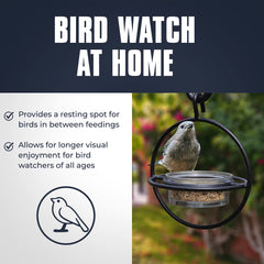 Close-up of the clear glass bowl of the bird feeder