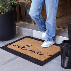 Close-up of the coir texture on THEODORE MAGNUS Welcome Mat