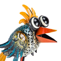 Close-up of the intricate details on the bird statue