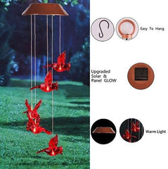Close-up of the red cardinal charms on the wind chime