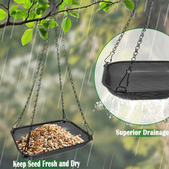 Close-up of the stainless steel mesh tray of the bird feeder