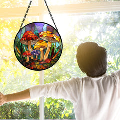 Close-up of the vibrant patterns on the DASTOLL stained glass suncatcher
