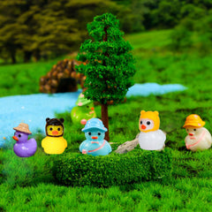 Close-up of various U-Zimikee Mini Resin Ducks with unique designs