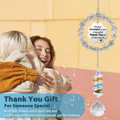 Close-up of VIVIKEN Sun Catcher crystal ball and flower charm