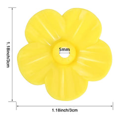 Close-up of yellow flower-shaped hummingbird feeder ports